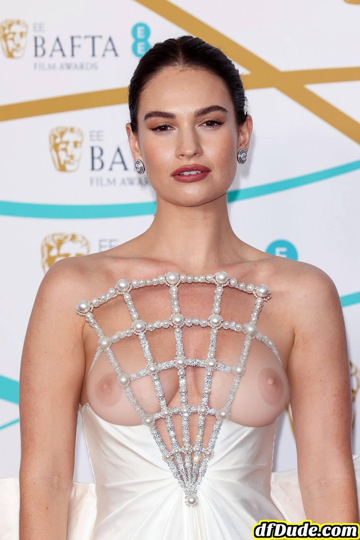 Lily James nipple visible at the 76th EE British Academy Film Awards (BAFTA 2023) at the Royal Festival Hall in London, UK